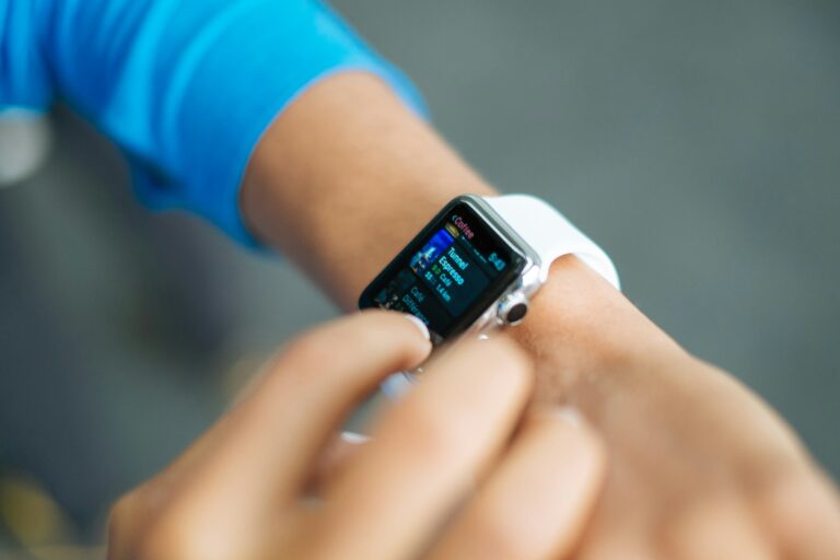Smartwatch on a wrist during exercise, illustrating third-party workouts now counting toward Cardio Load in Google Health