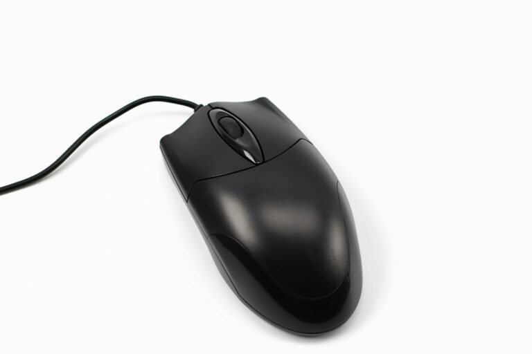 A computer mouse on a desk, illustrating the Googlebook's Gemini-powered Magic Pointer cursor