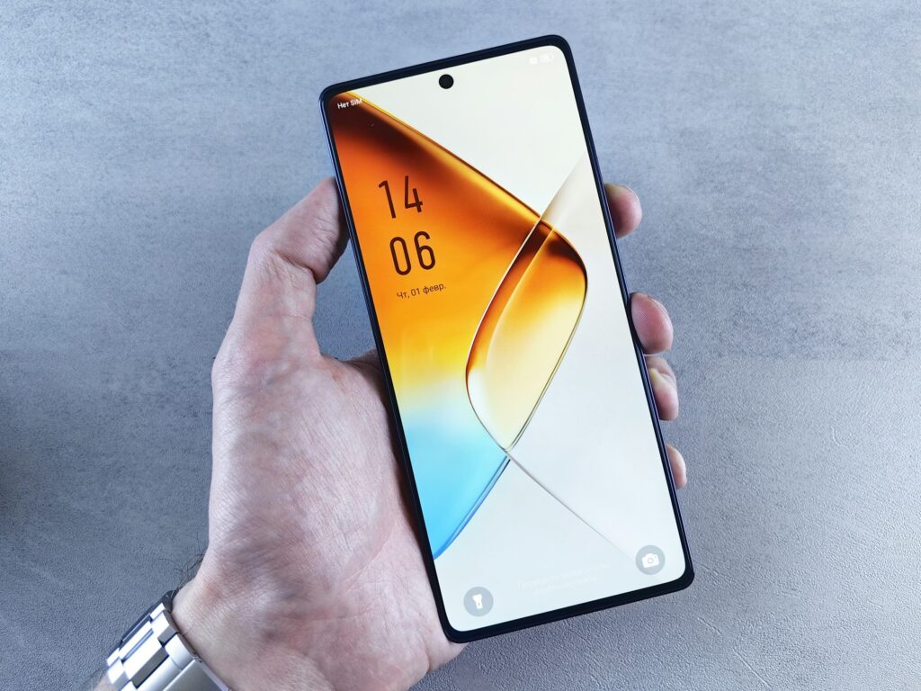 A hand holding a modern smartphone, illustrating Pixel owners locked out by a lock screen PIN and pattern bug