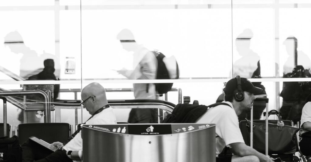 Travelers waiting in an airport terminal, where Google Wallet digital IDs can be used at some TSA checkpoints