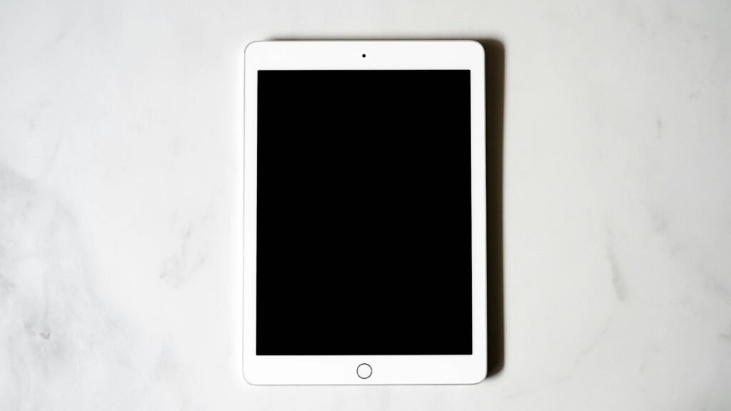 Black tablet lying on a table, representing the shrinking midrange Android tablet market after the Pixel Tablet's exit