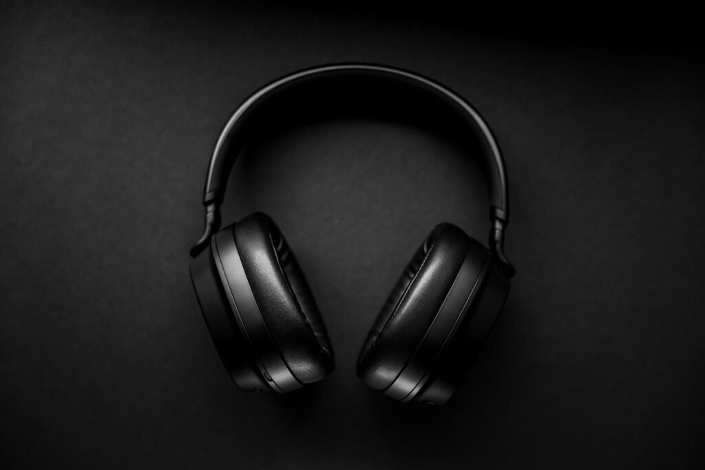 Black over-ear wireless headphones on a dark surface, the category Samsung's rumored Galaxy Studio would enter
