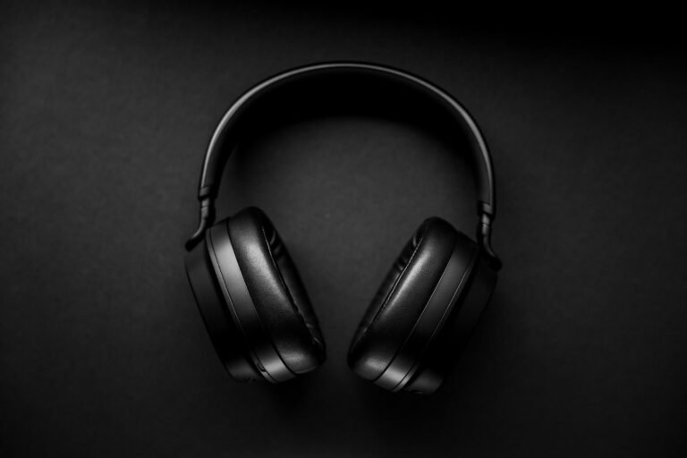 Black over-ear wireless headphones on a dark surface, the category Samsung's rumored Galaxy Studio would enter