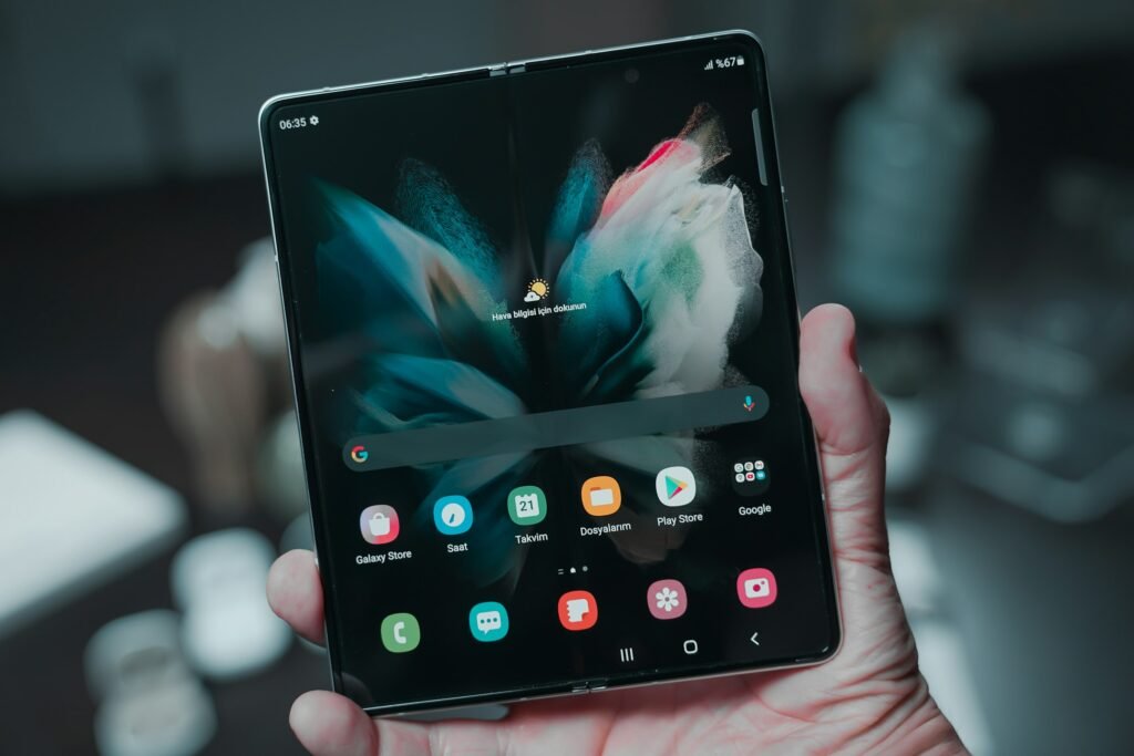 An unfolded Samsung Galaxy Z Fold foldable phone, the book-style design Apple's $1,999 iPhone Duo now competes with