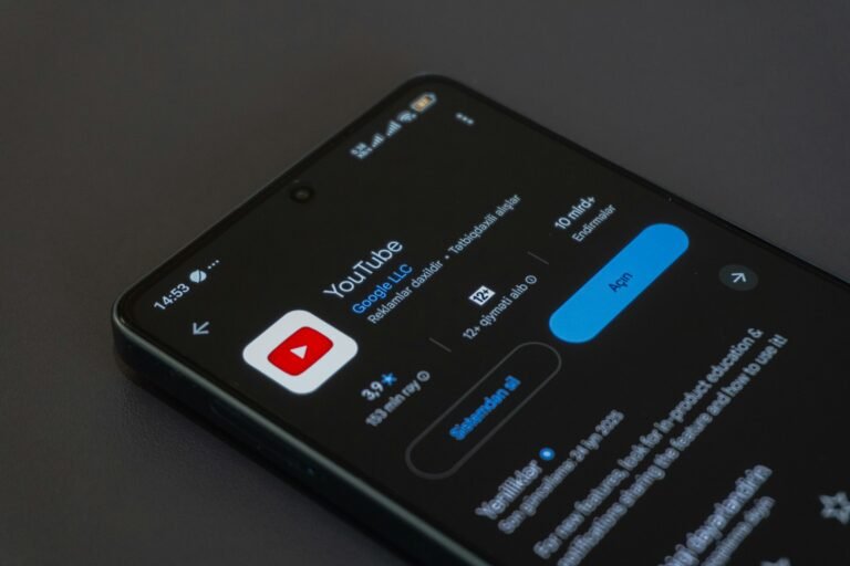 A smartphone screen showing the YouTube app, which now offers the Ask YouTube AI search to all US users